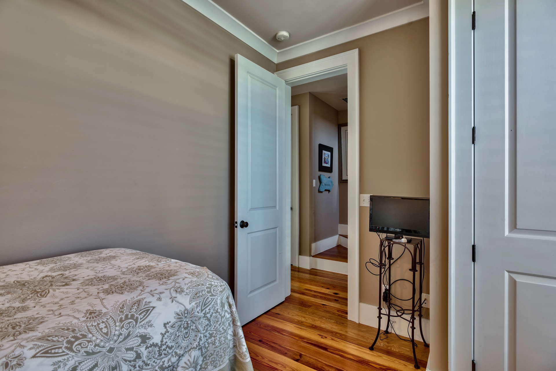 Twin room entrance with tv